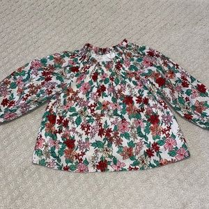 Girls blouse. Gold thread throughout and lined so not itchy!